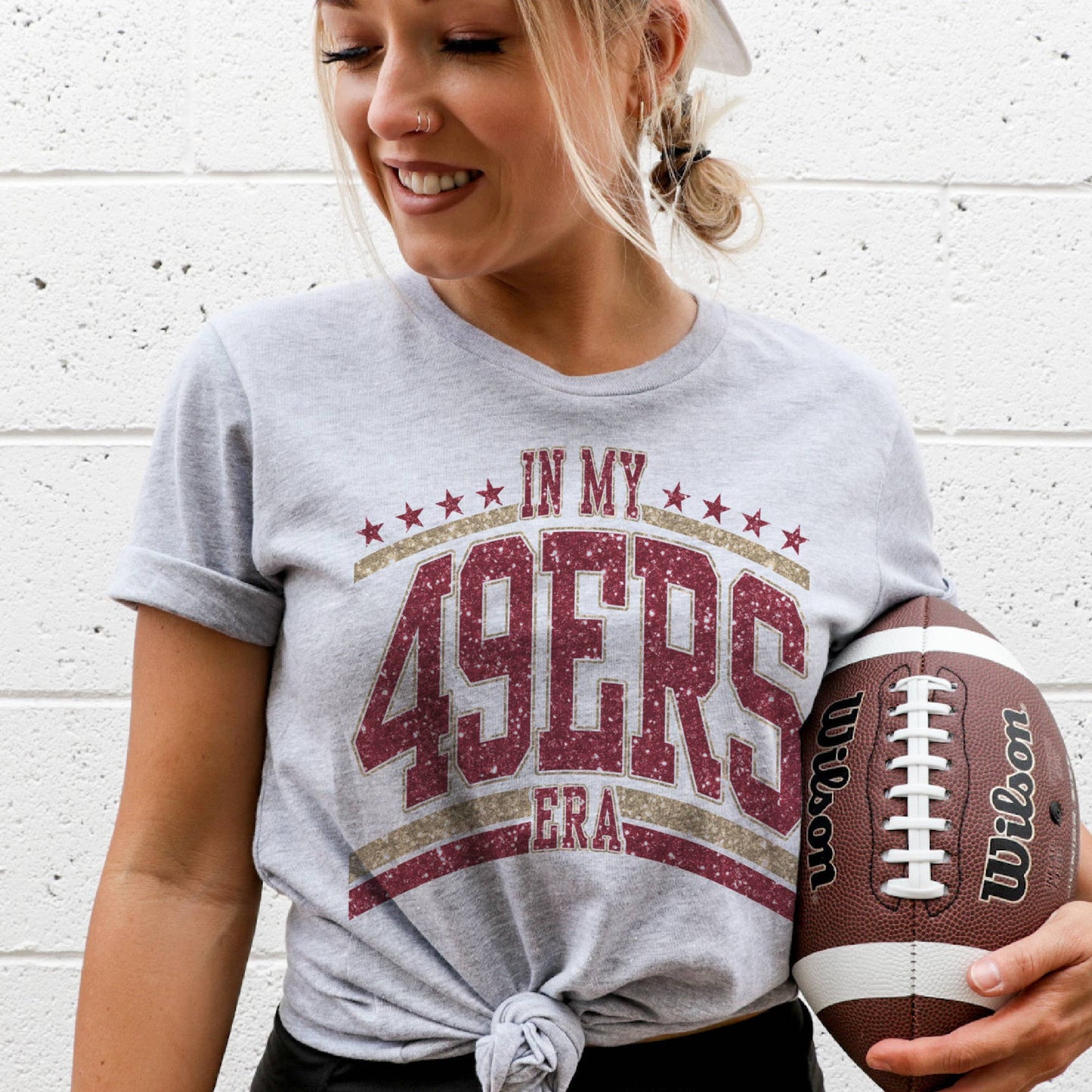Graphic tee with in my 49ers era tee-inspired text, styled for game day with denim or joggers.