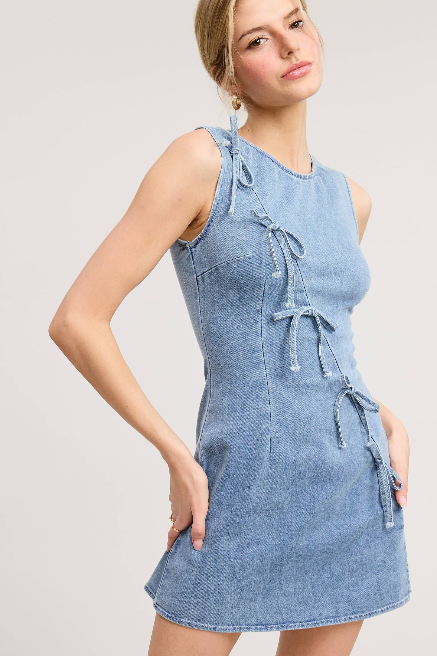The Bow & Go Mini Dress – Light Wash Denim