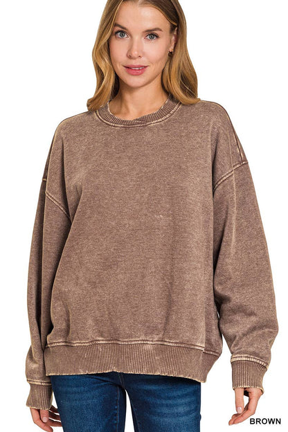 Woman wearing the coco comfort crew brown sweatshirt on a white background
