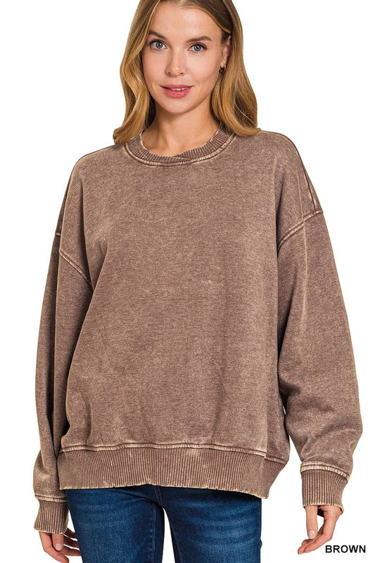 Woman wearing the coco comfort crew brown sweatshirt on a white background