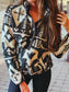 Aztec print snap fleece pullover in black and cream, worn by model in fall casual setting.
