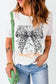 Halloween spooky witch social tee with witch graphic and leopard bow, styled with jeans for festive flair.